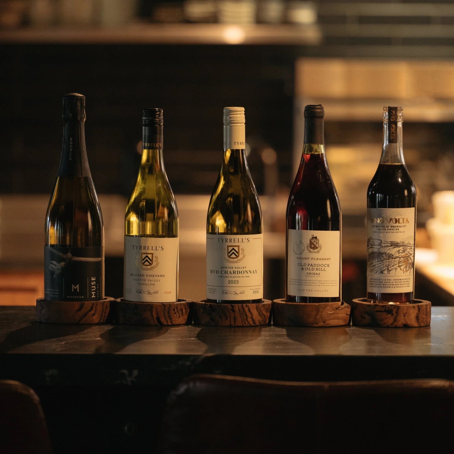 A lineup of Hunter Valley wine bottles at EXP.